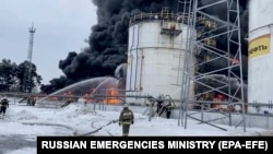 Russian firefighters battle a blaze following a reported Ukrainian drone attack on an oil depot near Bryansk. (file photo)